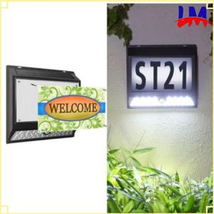 Lampe solaire et panneau publicitaire